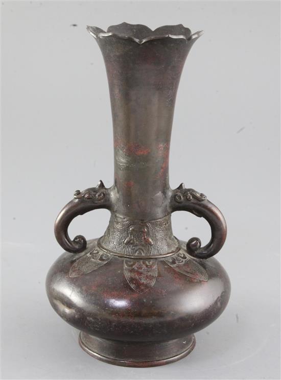 A Chinese bronze bottle vase, Song - Yuan dynasty, height 23cm, old repairs